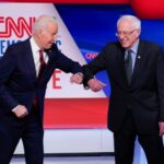 Joe Biden e Bernie Sanders se acotovelaram no palco em um debate na CNN.