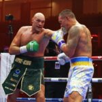 Oleksandr Usyk luta contra Tyson Fury durante uma luta pelo campeonato mundial de boxe peso pesado