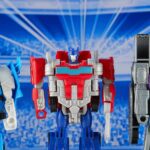 transformers-one-racing-warrior-3-pack-hasbro-optimus-prime-orion-pax-megatron-d-16-mirage-game-rant