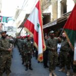 Membros da Frente Popular para a Libertação da Palestina-Comando Geral (PFLP-GC) marcham durante um desfile que marca o Dia anual de al-Quds, (Dia de Jerusalém), no campo de refugiados palestinos Burj al-Barajneh em Beirute, Líbano