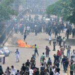 Manifestantes anti-quotas entram em confronto com a polícia em Dhaka