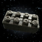 Imagem de um tijolo de lego feito com poeira lunar