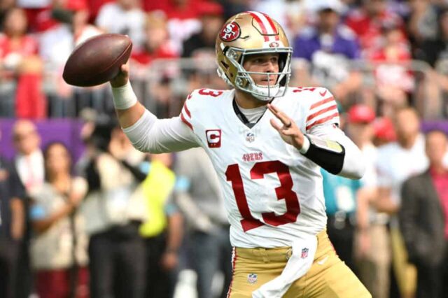 MINNEAPOLIS, MINNESOTA - 15 DE SETEMBRO: O quarterback Brock Purdy # 13 do San Francisco 49ers lança um passe contra o Minnesota Vikings durante o primeiro quarto no US Bank Stadium em 15 de setembro de 2024 em Minneapolis, Minnesota. 