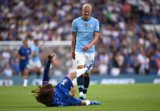 Marc Cucurella e Erling Haaland