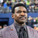 Michael Irvin, do Dallas Cowboys, assiste ao jogo contra o Seattle Seahawks e o Los Angeles Rams no CenturyLink Field em 3 de outubro de 2019 em Seattle, Washington. O Seattle Seahawks vence o Los Angeles Rams por 30-29.