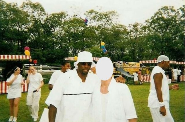 Sean 'Diddy' Combs é visto passando o braço em volta de um garoto de 16 anos que ele supostamente abusou sexualmente em uma festa branca nos Hamptons em 1998. 