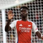 Bukayo Saka jogando pelo Arsenal na Liga dos Campeões