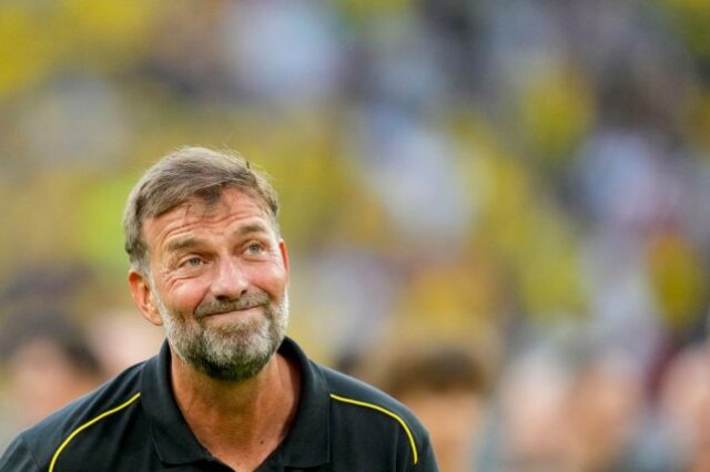 Jürgen Klopp ri durante a partida de despedida dos anfitriões do Bourssia Dortmund para Lukasz Piszczek e Jakub Blaszczykowski no Signal Iduna Park